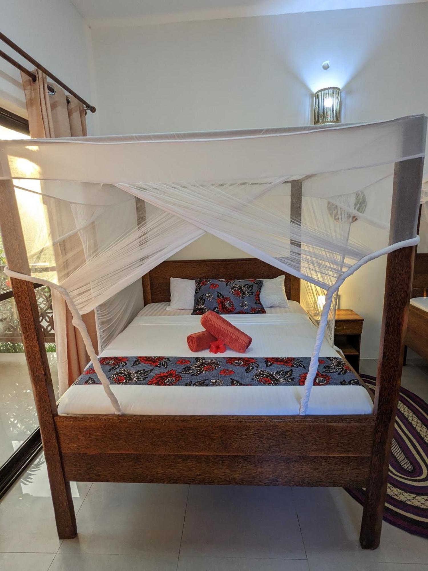 Mkadi Beach House Nungwi Quarto foto