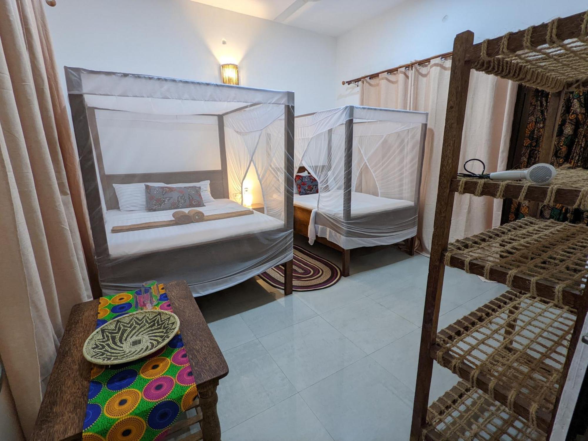 Mkadi Beach House Nungwi Quarto foto