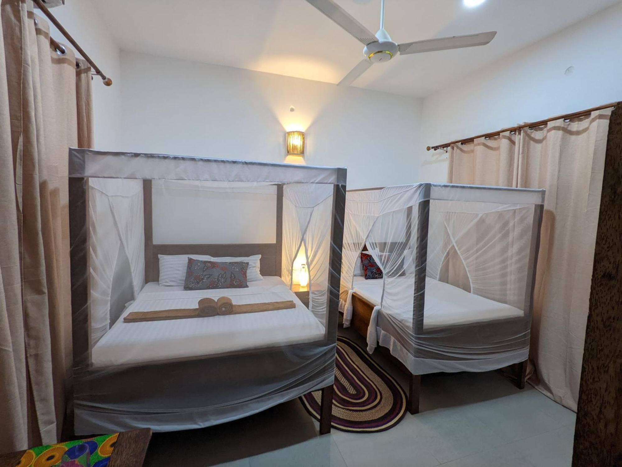 Mkadi Beach House Nungwi Quarto foto