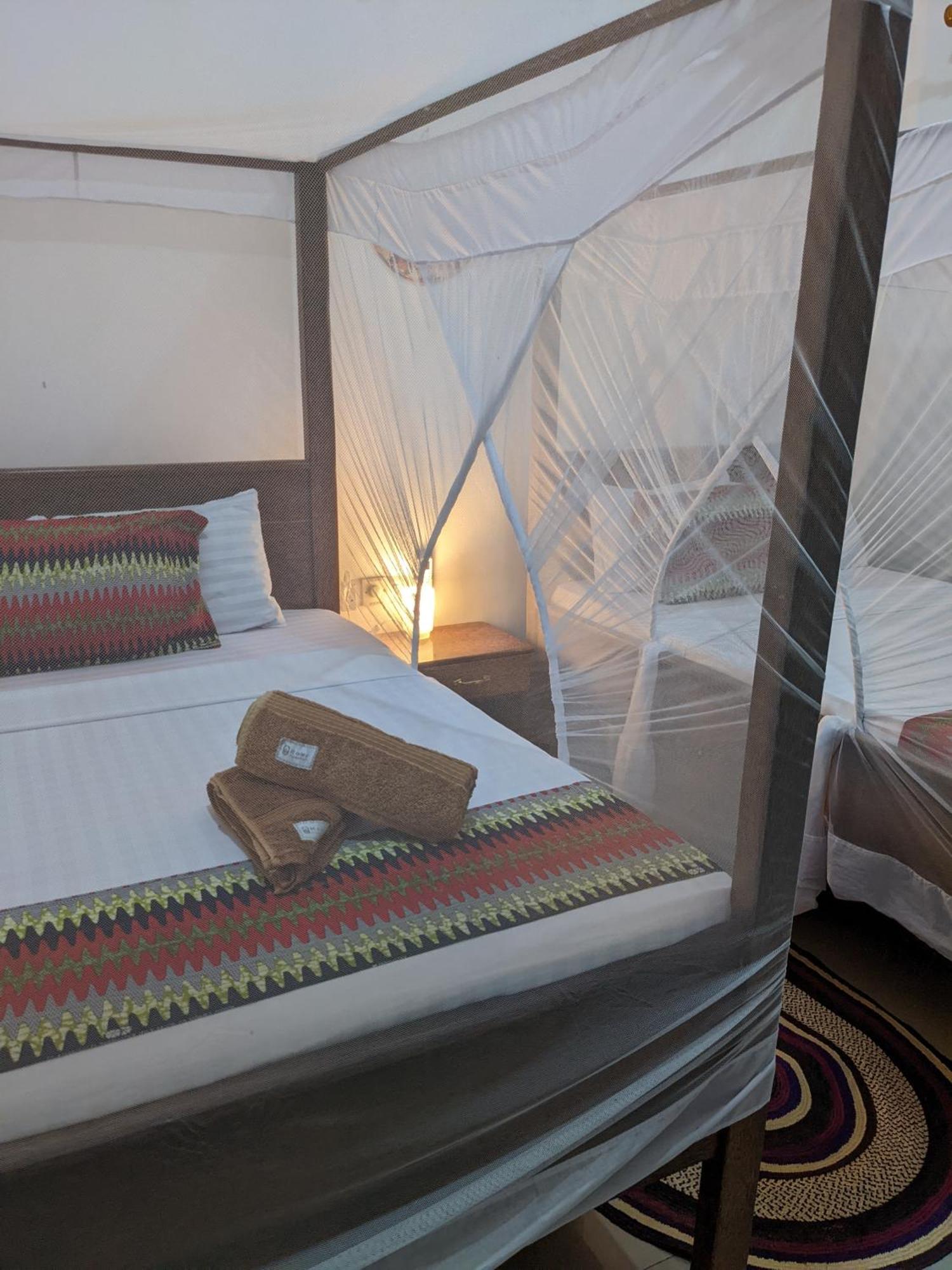 Mkadi Beach House Nungwi Quarto foto